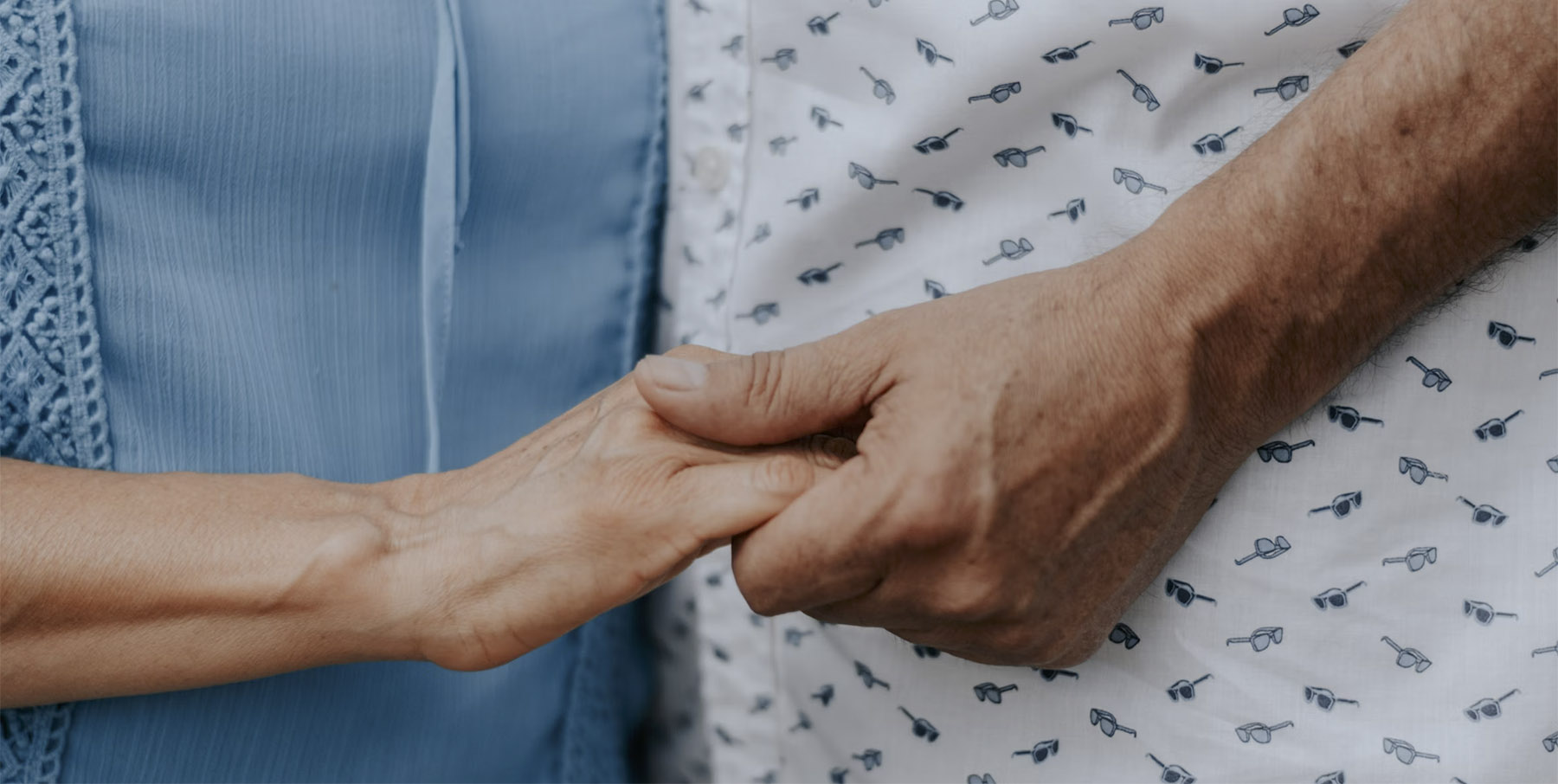Patient and doctor hand holding