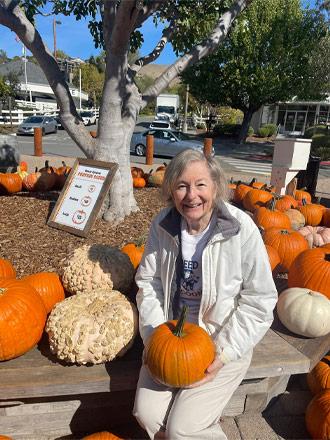 Woman at pumpkin patch