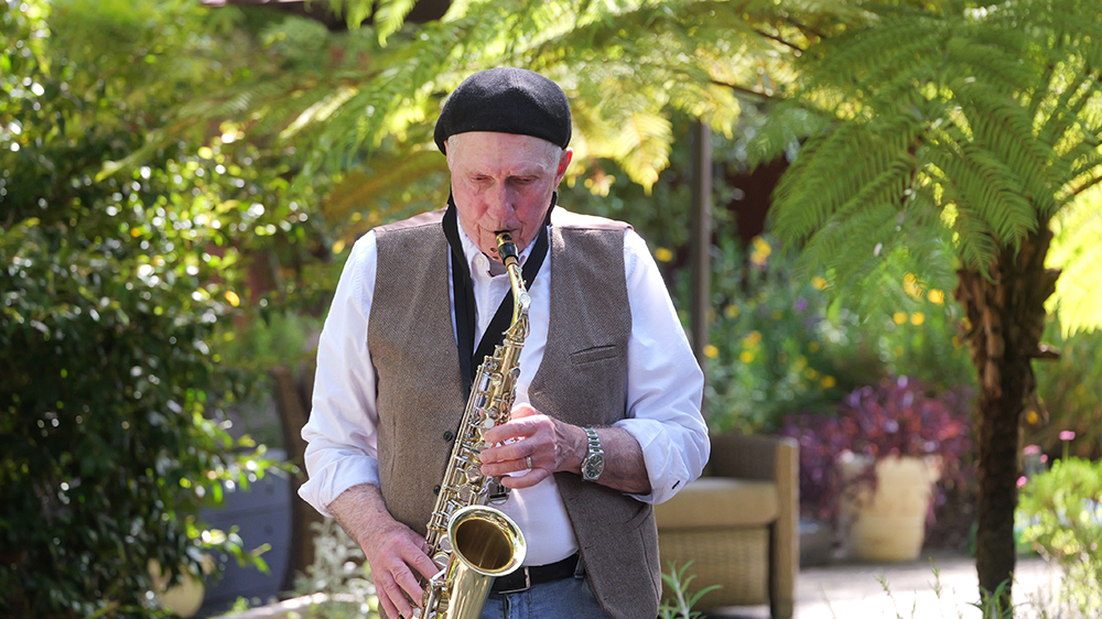 sax player in garden